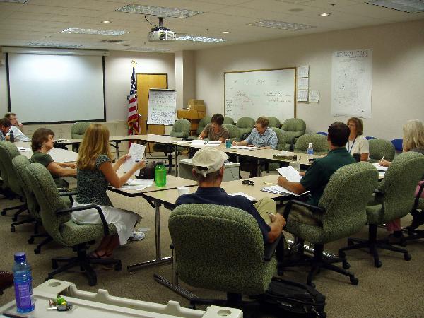 Note how most of the group participants pay no attention to what is happening.